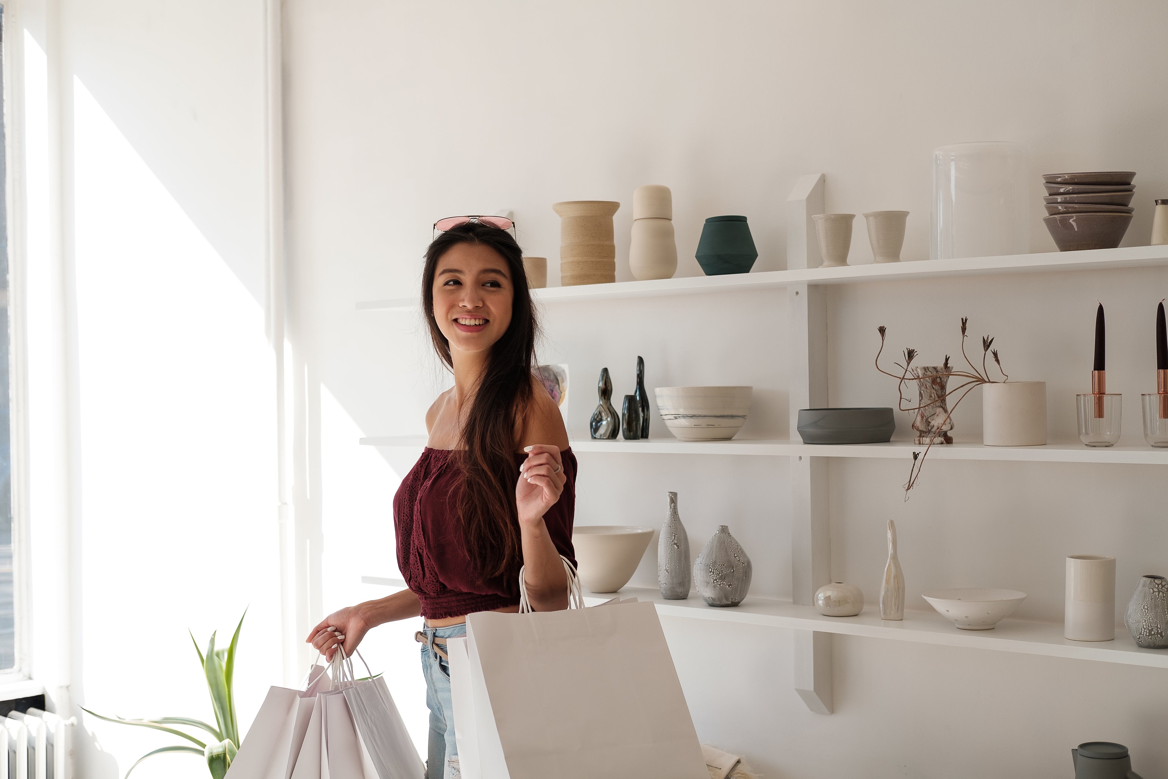 files/woman-with-white-crisp-shopping-carrier-bags.jpg